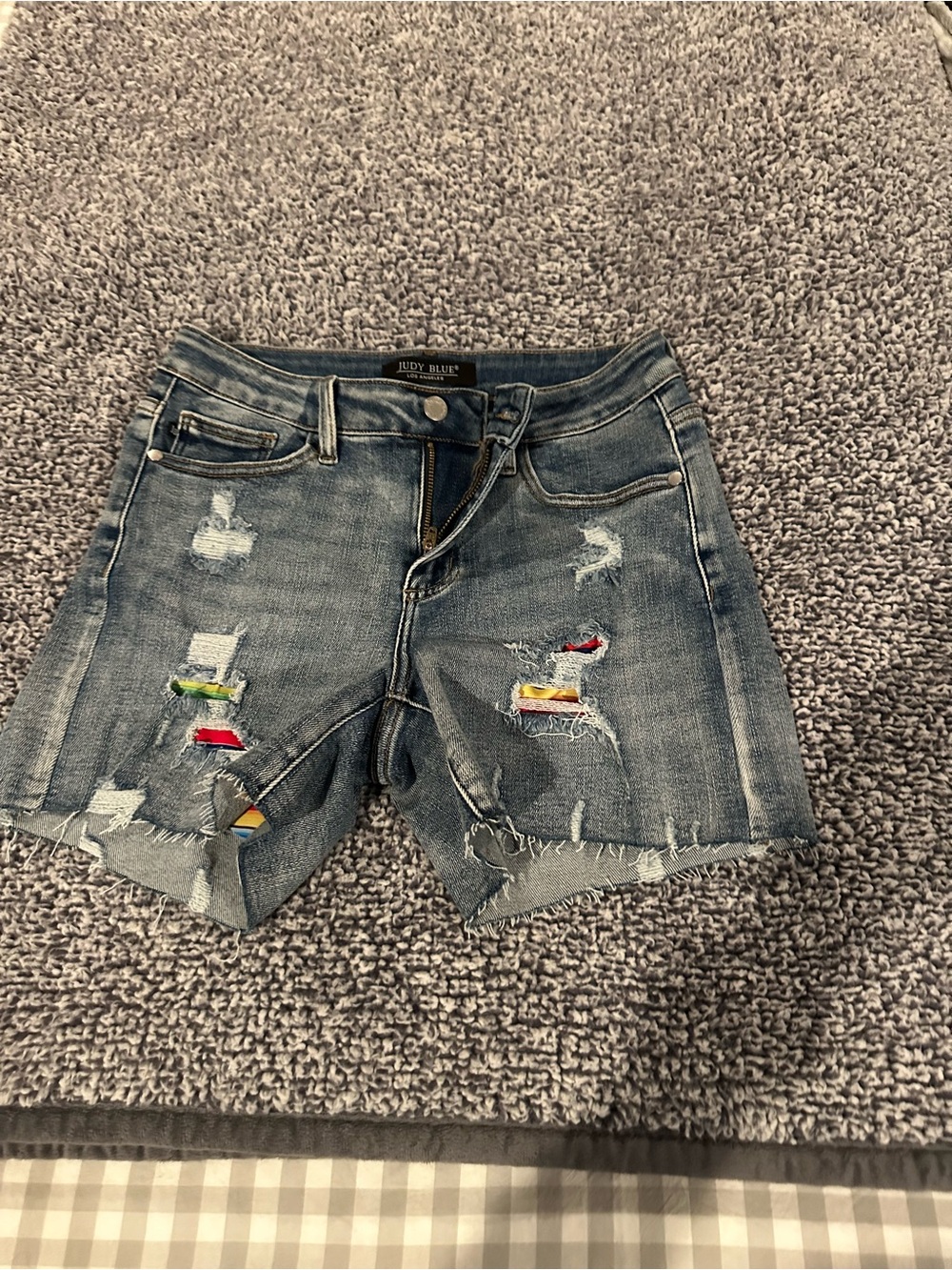Judy Blue Medium Blue Distressed Jean Shorts with serape’ Patch Accents